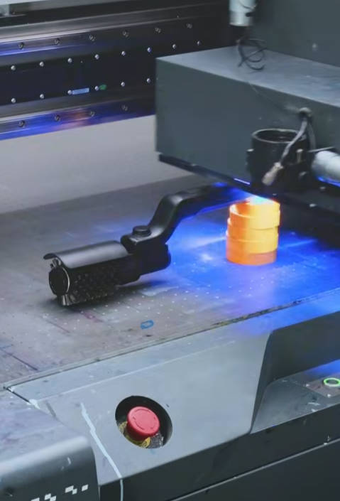 Watch our Visual Positioning UV Printer scan this curved cleaning tool handle and drop a logo.